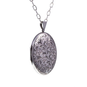 Vintage Engraved Silver Oval Locket - Angle - Jewellery Hound
