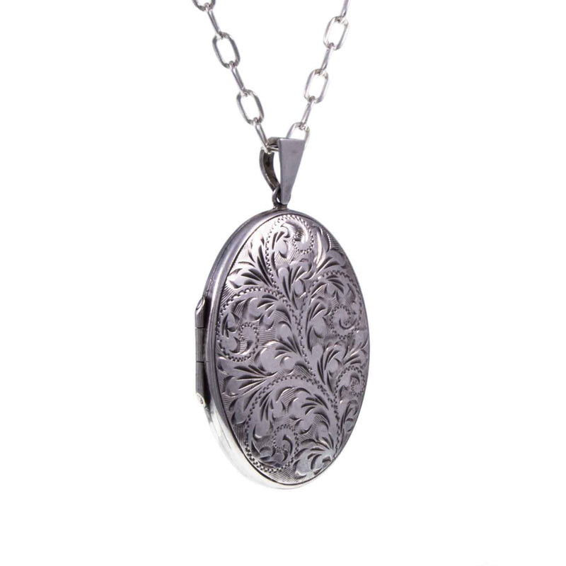 Vintage Engraved Silver Oval Locket - Angle - Jewellery Hound