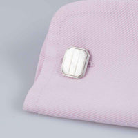 A Pair of Vintage Mother of Pearl Art Deco Men's Cuff Links on Shirt