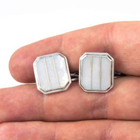 A Pair of Vintage Mother of Pearl Art Deco Men's Cuff Links in Hand