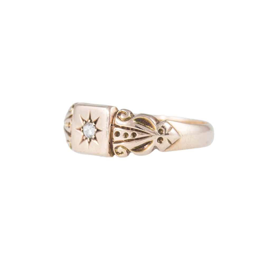 Angled View of Dainty Antique 9ct Rose Gold Star Set Diamond Signet Ring