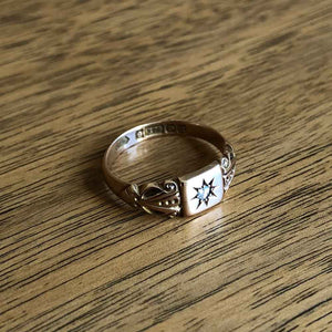 Dainty Antique 9ct Rose Gold Star Set Diamond Signet Ring with Wood Background