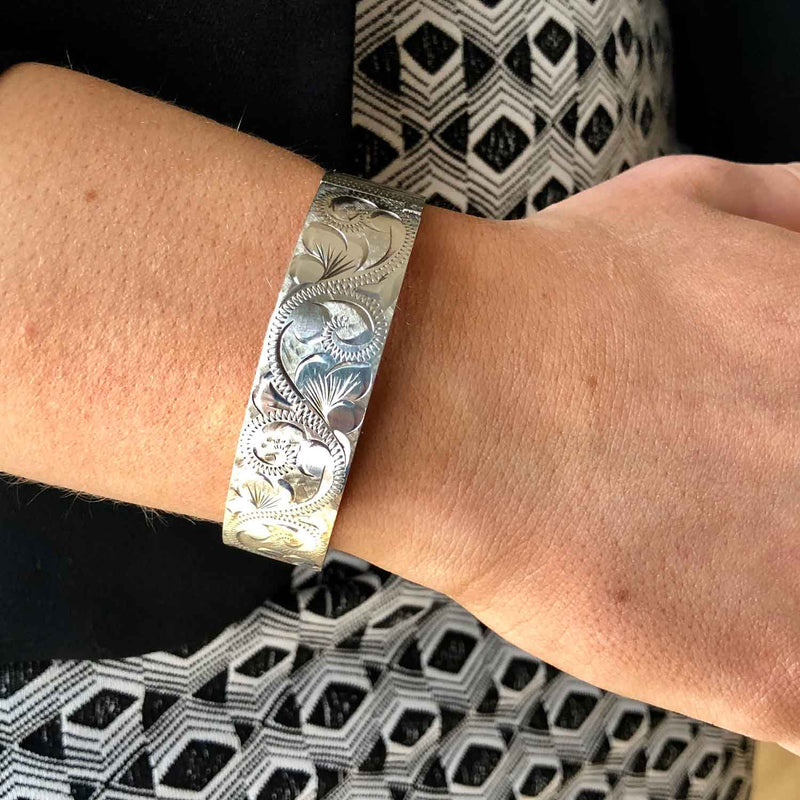 Vintage Sterling Silver Engraved Hinged Solid Bangle on wrist