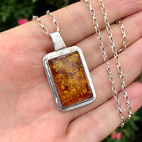 Modernist Vintage Imported Silver Amber Pendant and Chain in Hand