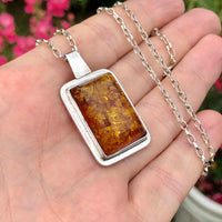 Modernist Vintage Imported Silver Amber Pendant and Chain in Hand