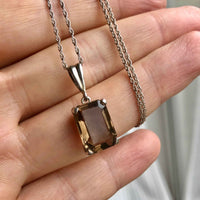 Vintage Smokey Quartz Silver Pendant Hanging in Hand