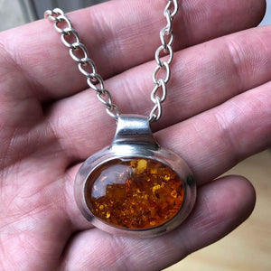 Minimalist Vintage Sterling Silver Amber Pendant in Hand