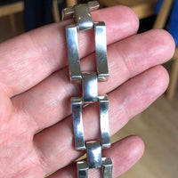 Chunky Vintage Egyptian Silver Gate Bracelet in Hand