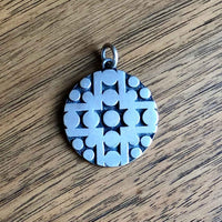 Retro Design 1960s Sterling Silver Disc Pendant Wood Background