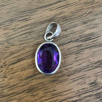 Large Vintage Synthetic Oval Amethyst Pendant Face on Wooden Table