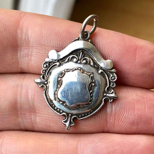 Vintage Silver Watch Fob Medal Pendant 1946 in Hand