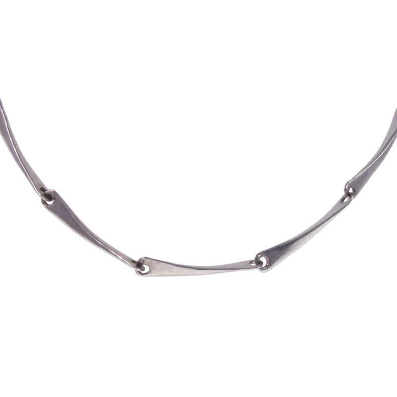 Close up of Hanging Modernist Hammered Sterling Silver Linked Necklace