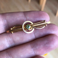 Vintage Art Deco 9k Gold Peridot Bar Brooch in Hand