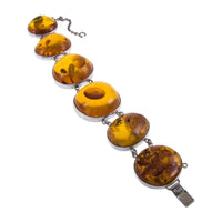 Chunky Vintage Sterling Silver Baltic Amber Bracelet lying Flat on White Background